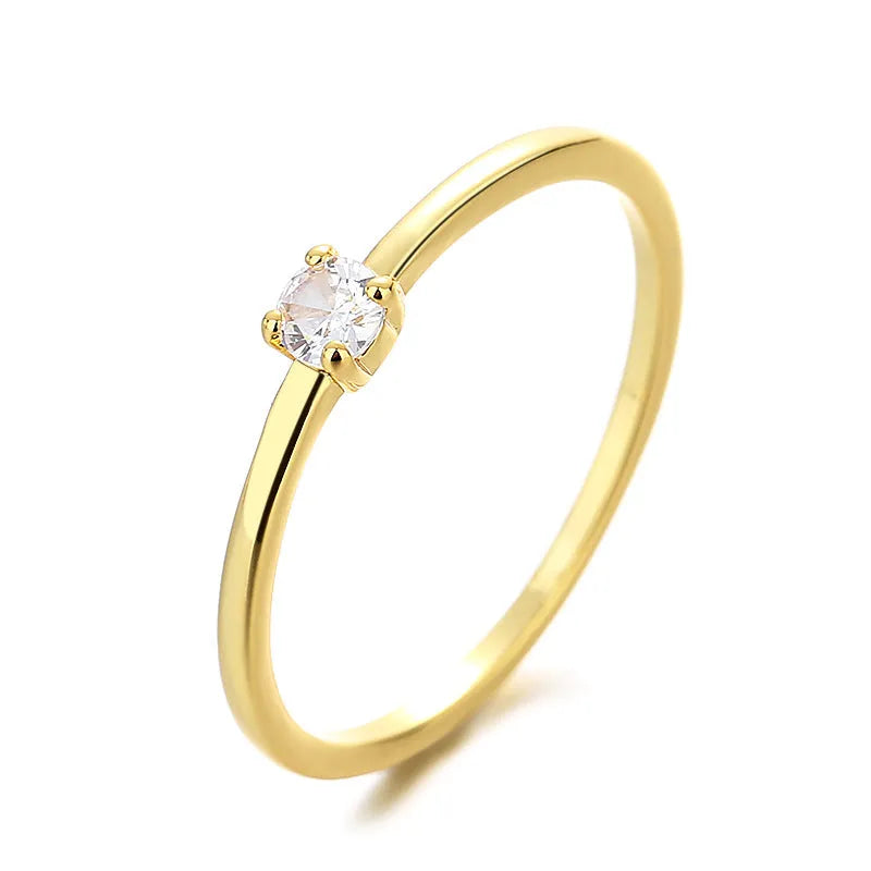 Personalised women's copper ring with a single diamond in a geometric fine circle design.