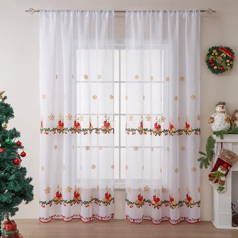 Pair of red and white American Christmas curtains with embroidered snowflake design hung on a window.