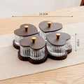 Glass fruit and snacks serving platter with multiple compartments and transparent heart-shaped lids in a retro style.