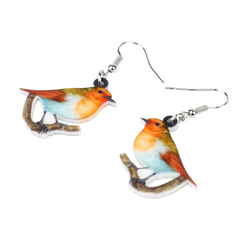 Blue Titmouse bird charm acrylic drop earrings with geometric patterns on clear pendant and silver steel posts.