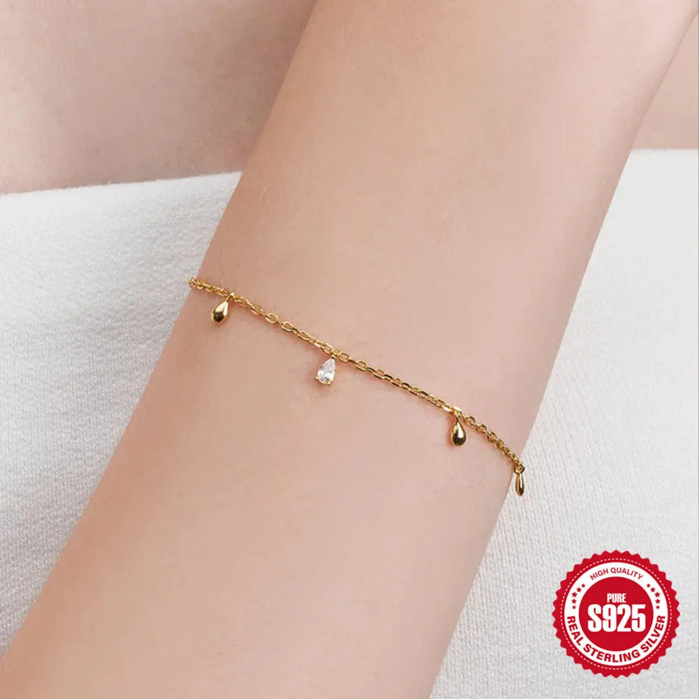 Sterling silver bracelet with gold-colour water drop diamond pendant geometric design