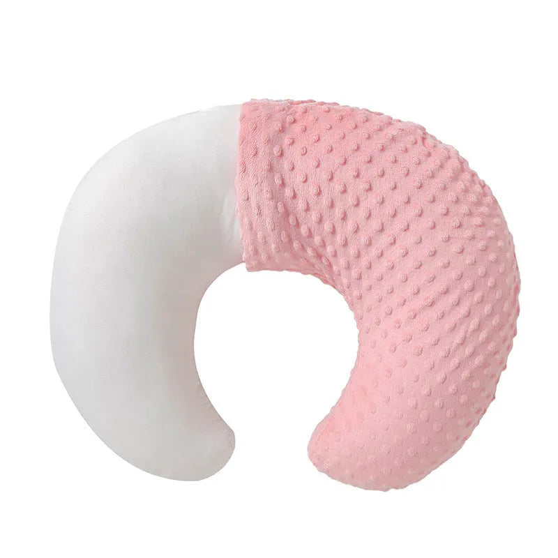 Gray U-shaped nursing pillow with removable cover on a neutral background.