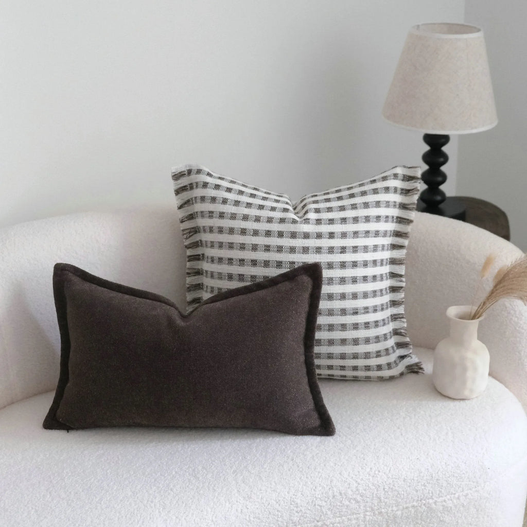 Coffee brown striped decorative cushion on a grey sofa, showing lumbar and square size options.
