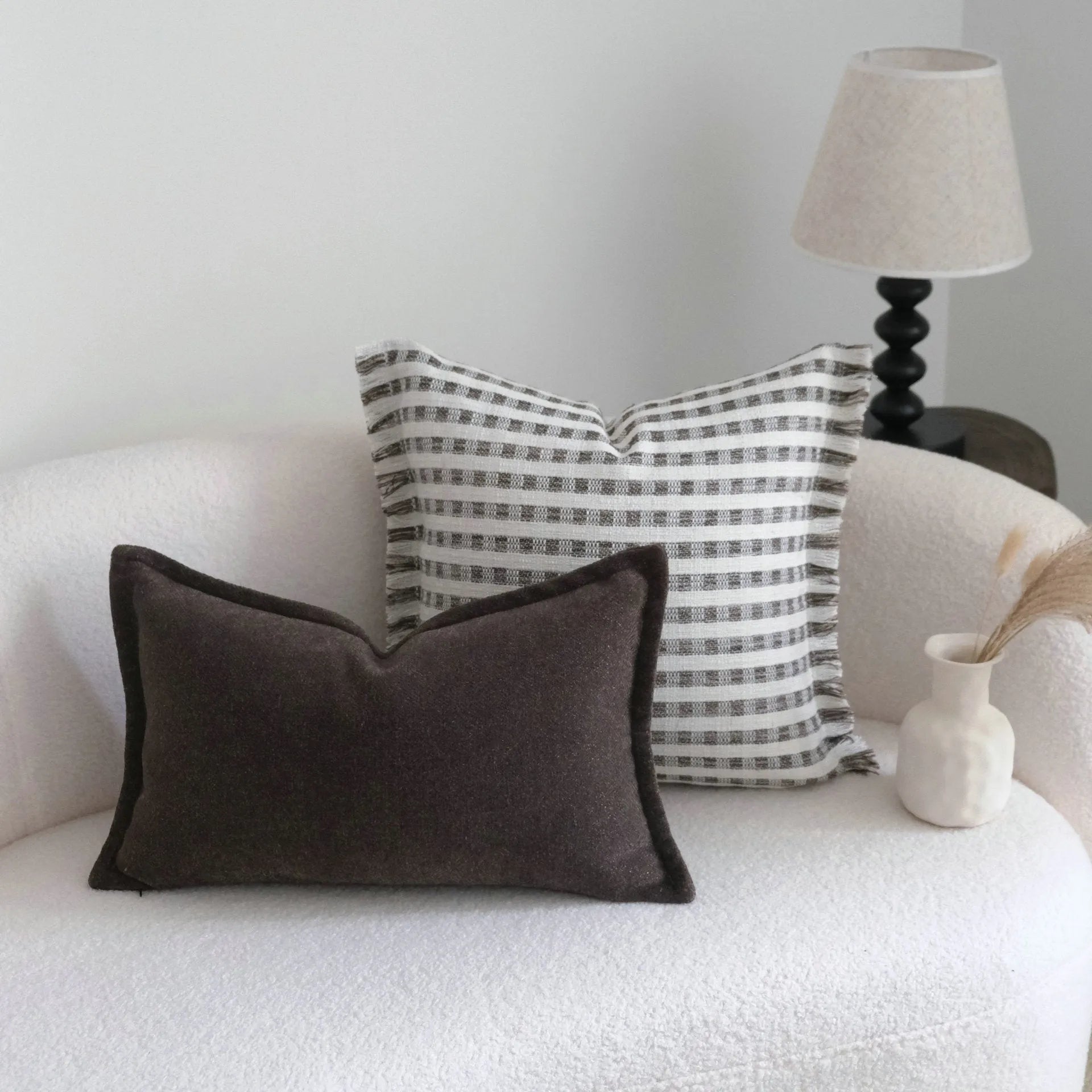 Coffee brown striped decorative cushion on a grey sofa, showing lumbar and square size options.