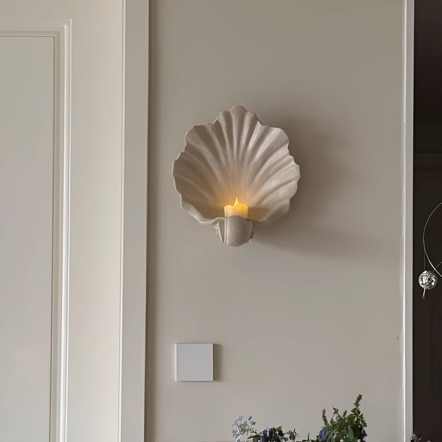 White resin fruit plate ornament with simulated shell storage design on wooden table