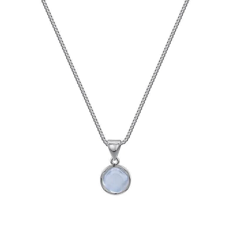 Women's oval geometric pendant necklace with artificial crystal on an adjustable silver-toned box chain.