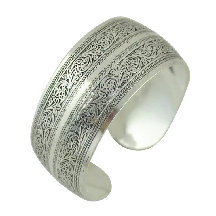 Ethnic carved open Miao silver style bracelet in alloy with Roman shape design