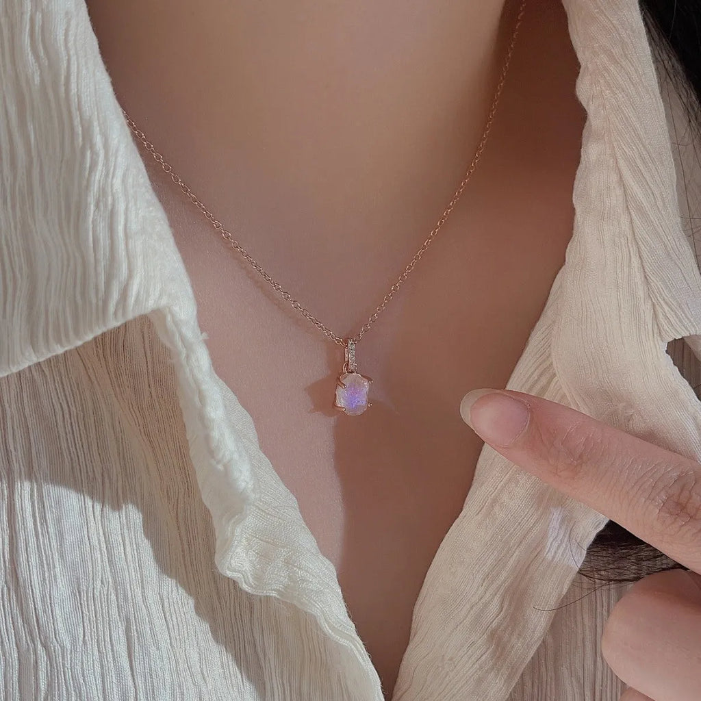 Geometric crystal moonstone pendant on sterling silver curb chain necklace
