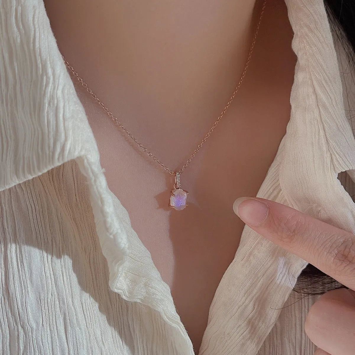 Geometric crystal moonstone pendant on sterling silver curb chain necklace