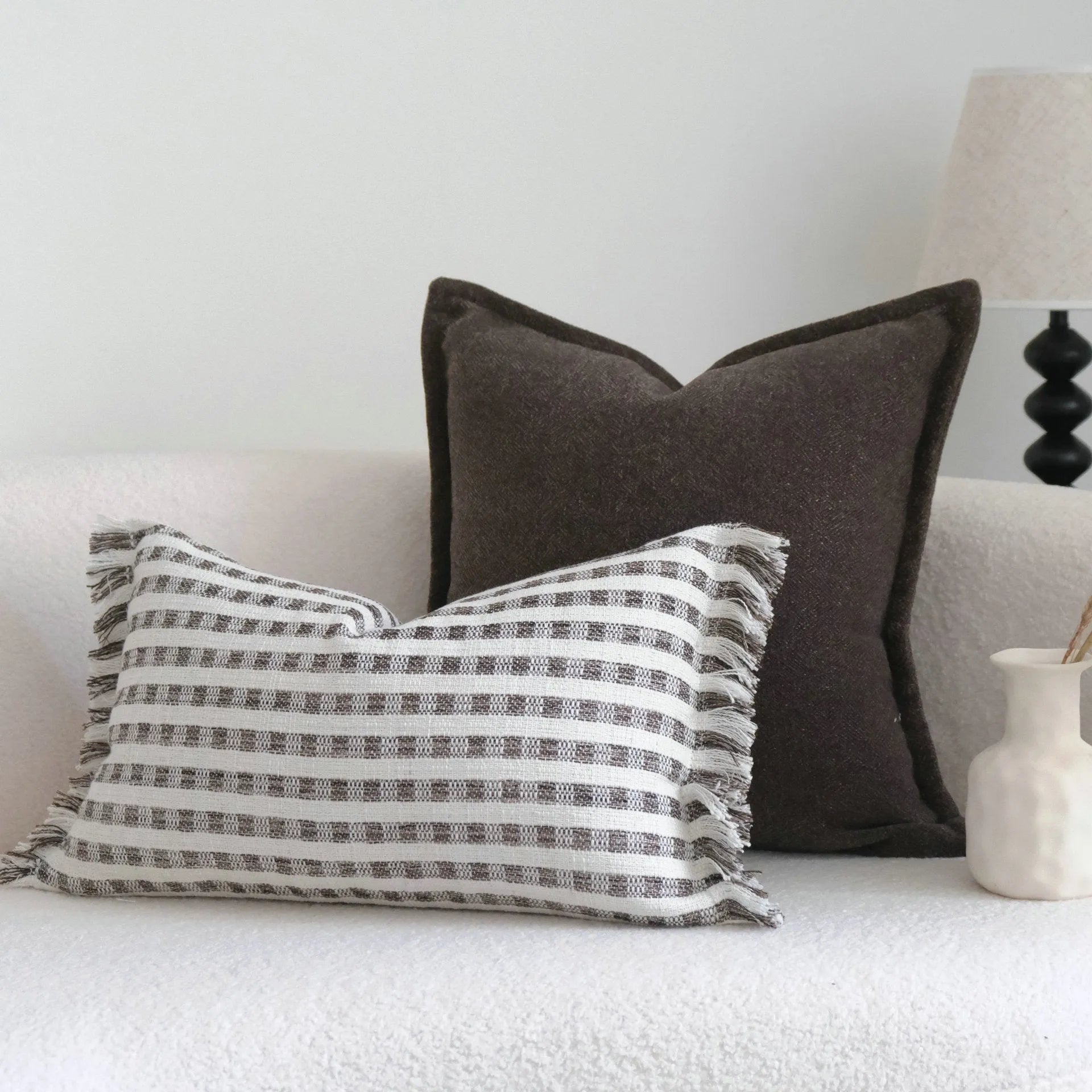 Coffee brown striped decorative cushion on a grey sofa, showing lumbar and square size options.