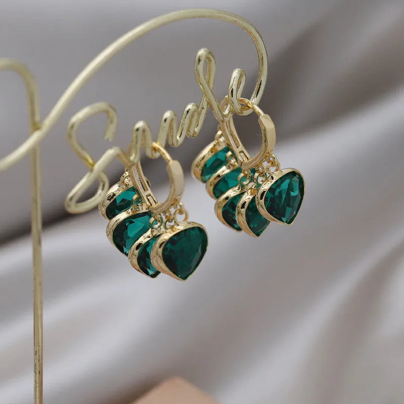 Green heart-shaped Korean style ear clip earrings with glass and artificial gemstone detailing
