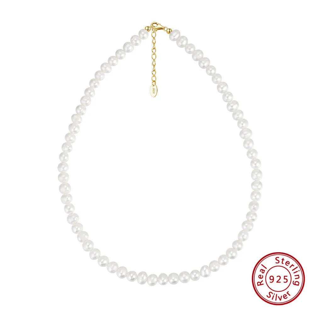 Close-up of a women's adjustable sterling silver necklace with a 6-7mm natural freshwater pearl pendant.