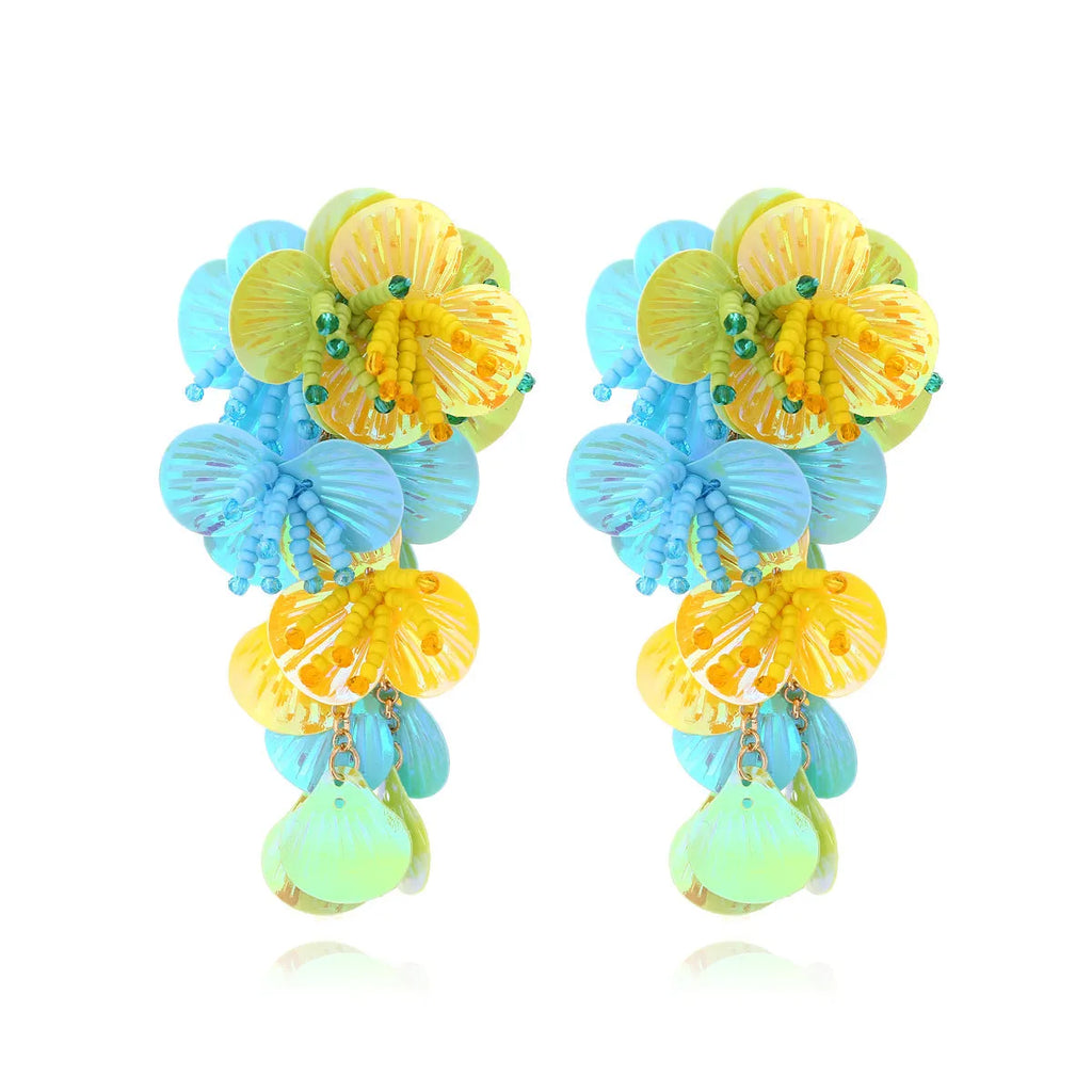 Handmade colourful flower and leaf bead earrings in exaggerated European American style.