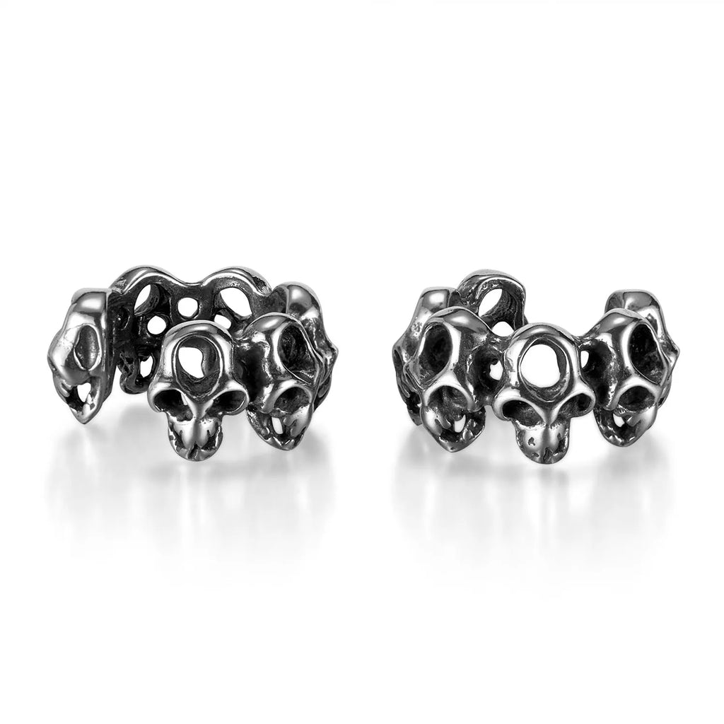 Retro skull design stainless steel ear clips with hollow geometry and electroplated finish