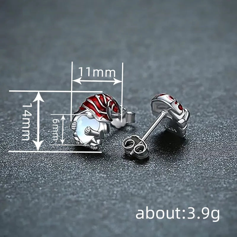 Close-up of women's heart-shaped earrings with a Santa Claus design in a white gold colour finish.