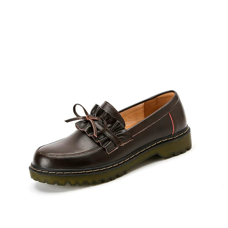 Women's black leather shoes with round toe and chunky flat heel, British style low-top design.