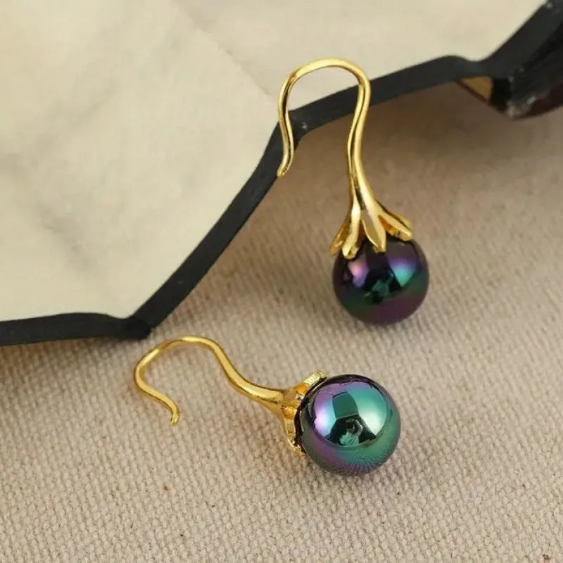 Retro creative women's earrings with imitation gold electroplated finish on alloy base