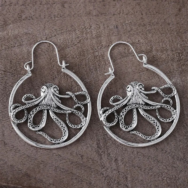 Vintage-style octopus earrings in antique silver with animal zodiac design