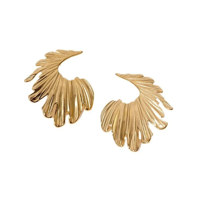 A pair of stainless steel stud earrings in a leaf shape, shown in gold colour and steel colour finishes.