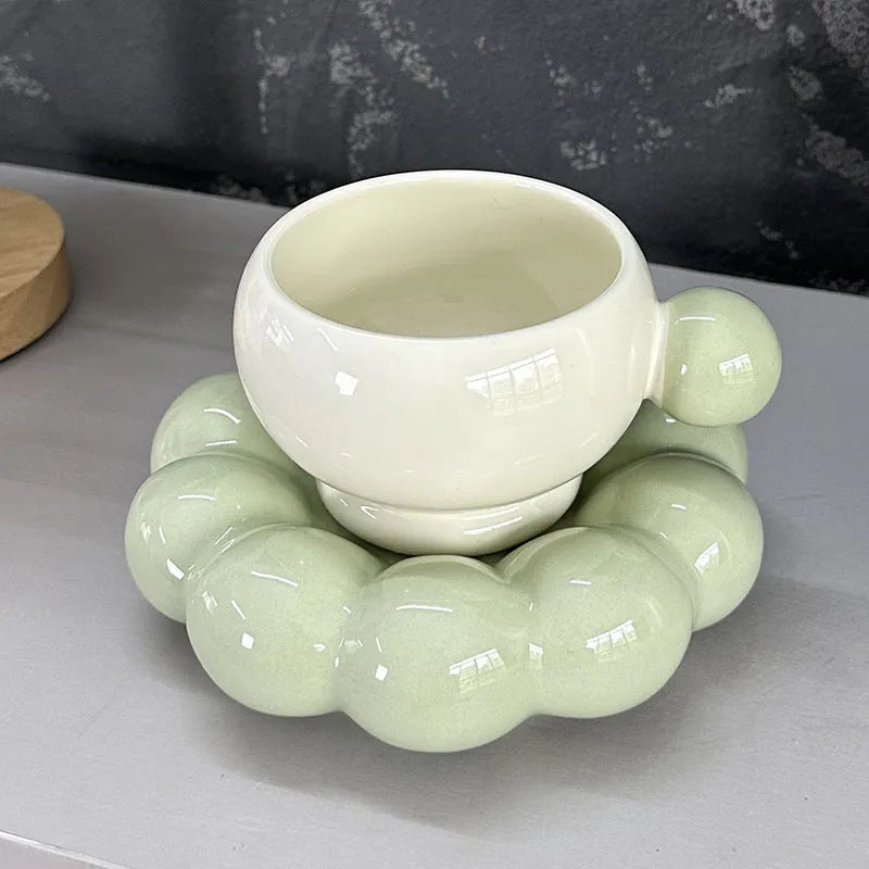 Ceramic coffee cup and saucer set in a simple Nordic style, shown in one of five colour options.
