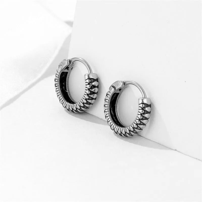 Silver retro twist geometric earrings with stripes pattern, made from titanium steel alloy.