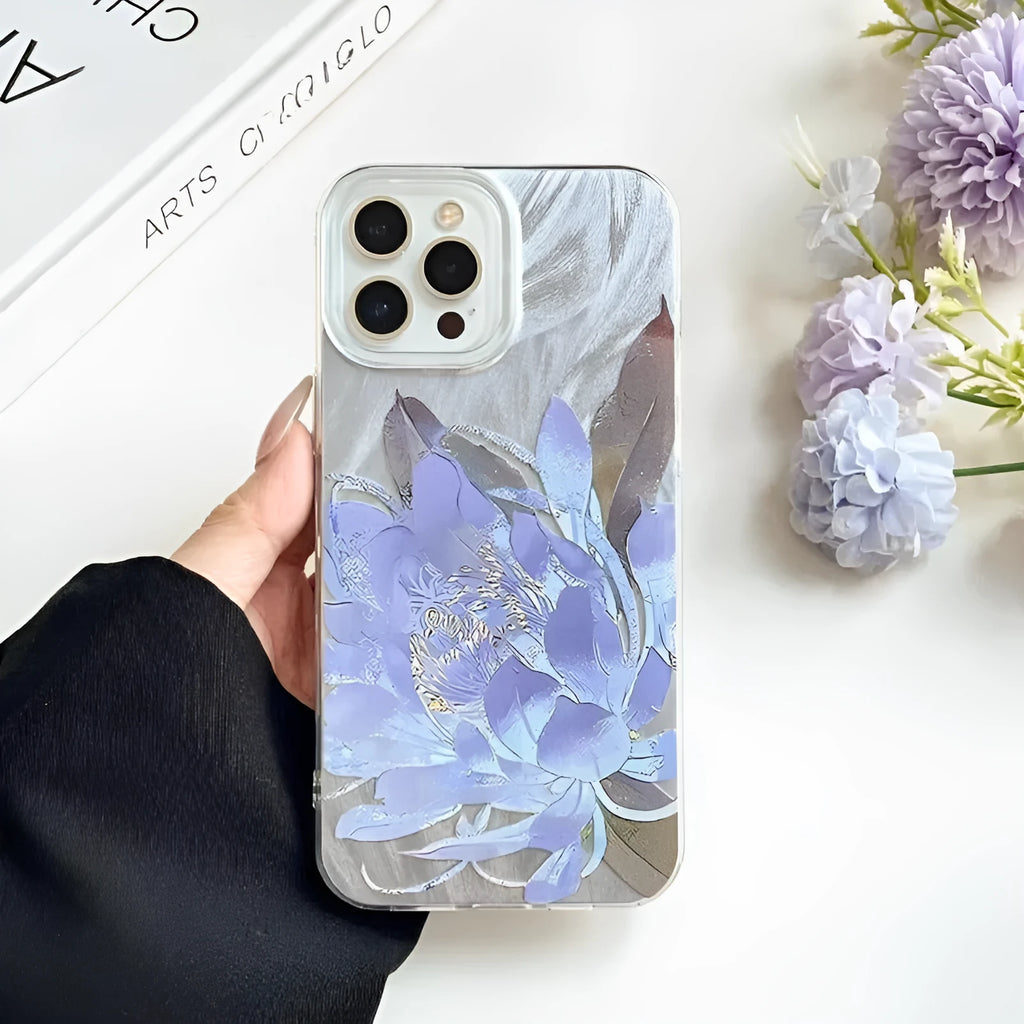 Blue Lotus light luxury hard PC phone case for Apple iPhone on a table.