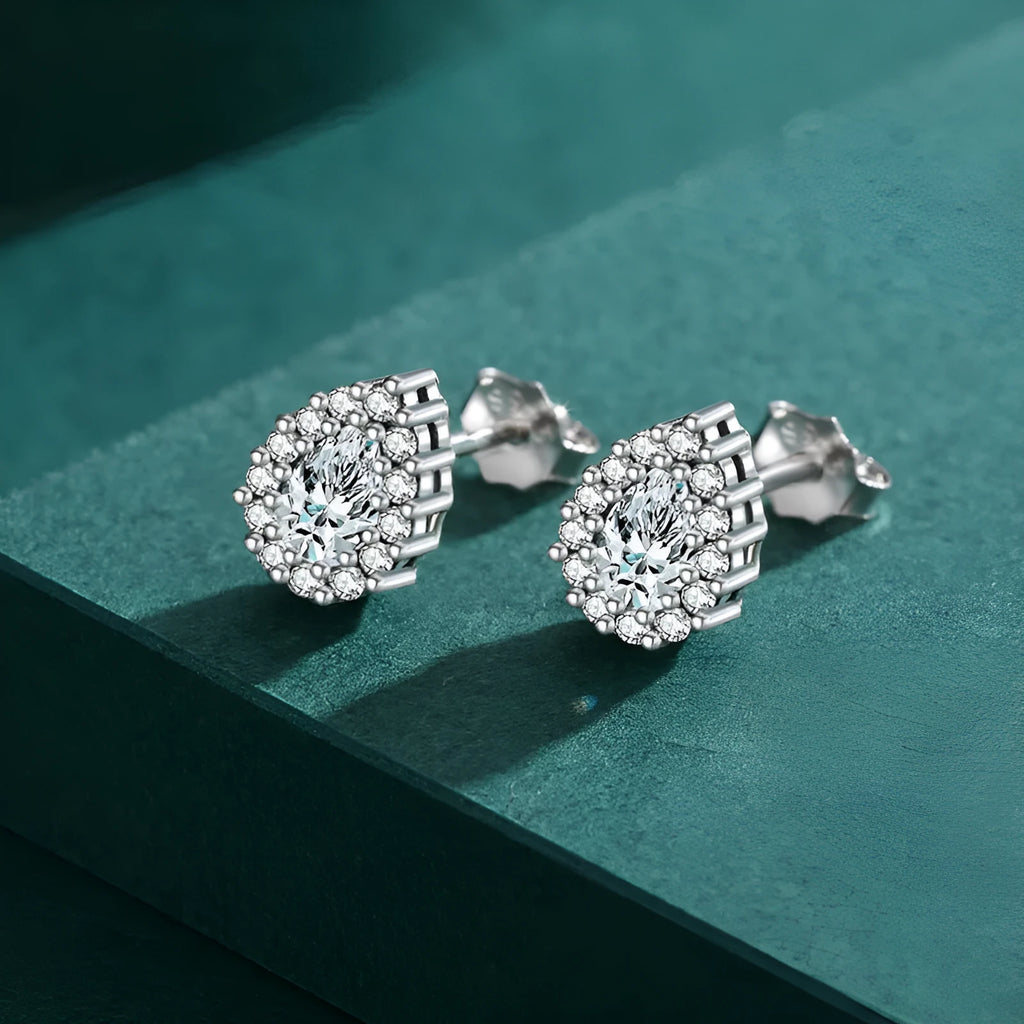 A pair of silver water drop shaped ear studs made from 925 sterling silver.