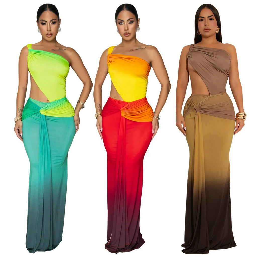 Long brown, green, and red gradient colour dress with a high waist, cross-shoulder neckline, and sleeveless design on a mannequin.