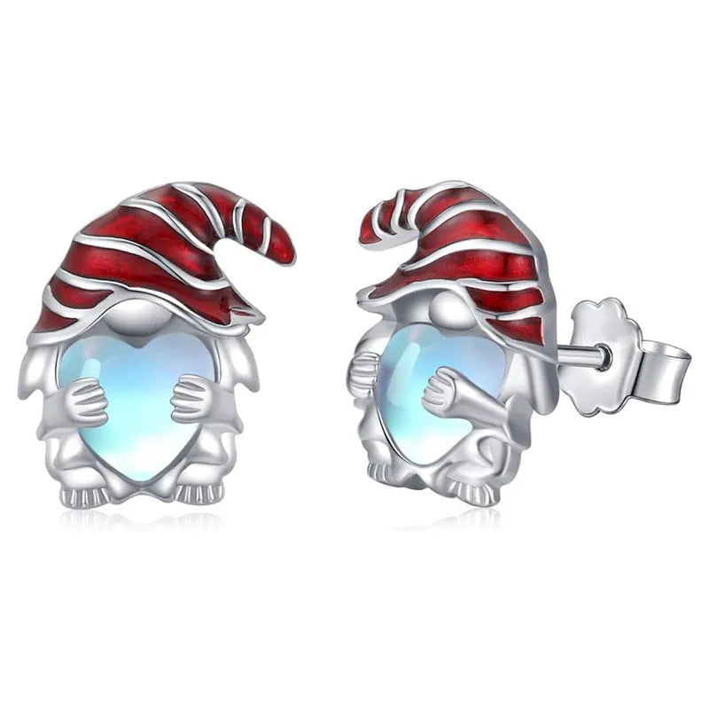 Close-up of women's heart-shaped earrings with a Santa Claus design in a white gold colour finish.
