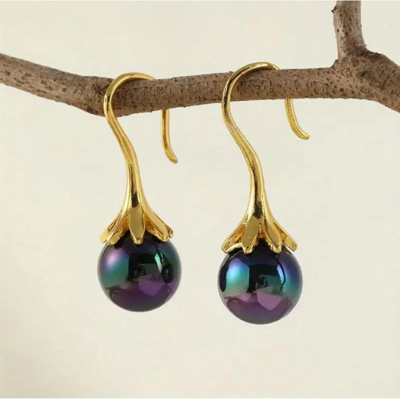 Retro creative women's earrings with imitation gold electroplated finish on alloy base