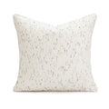 A square pp cotton pillow cushion with a solid red-brown abstract print cover on a sofa.