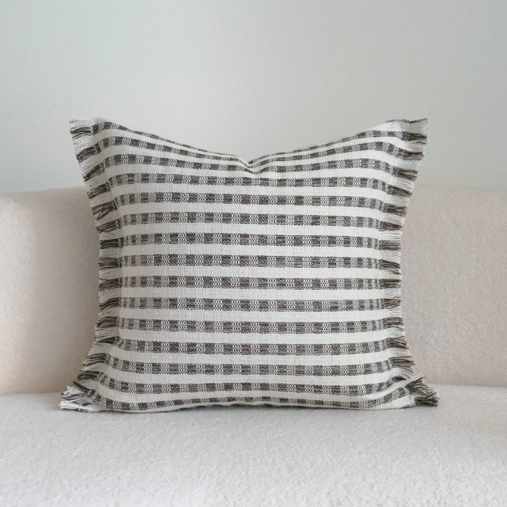 Coffee brown striped decorative cushion on a grey sofa, showing lumbar and square size options.