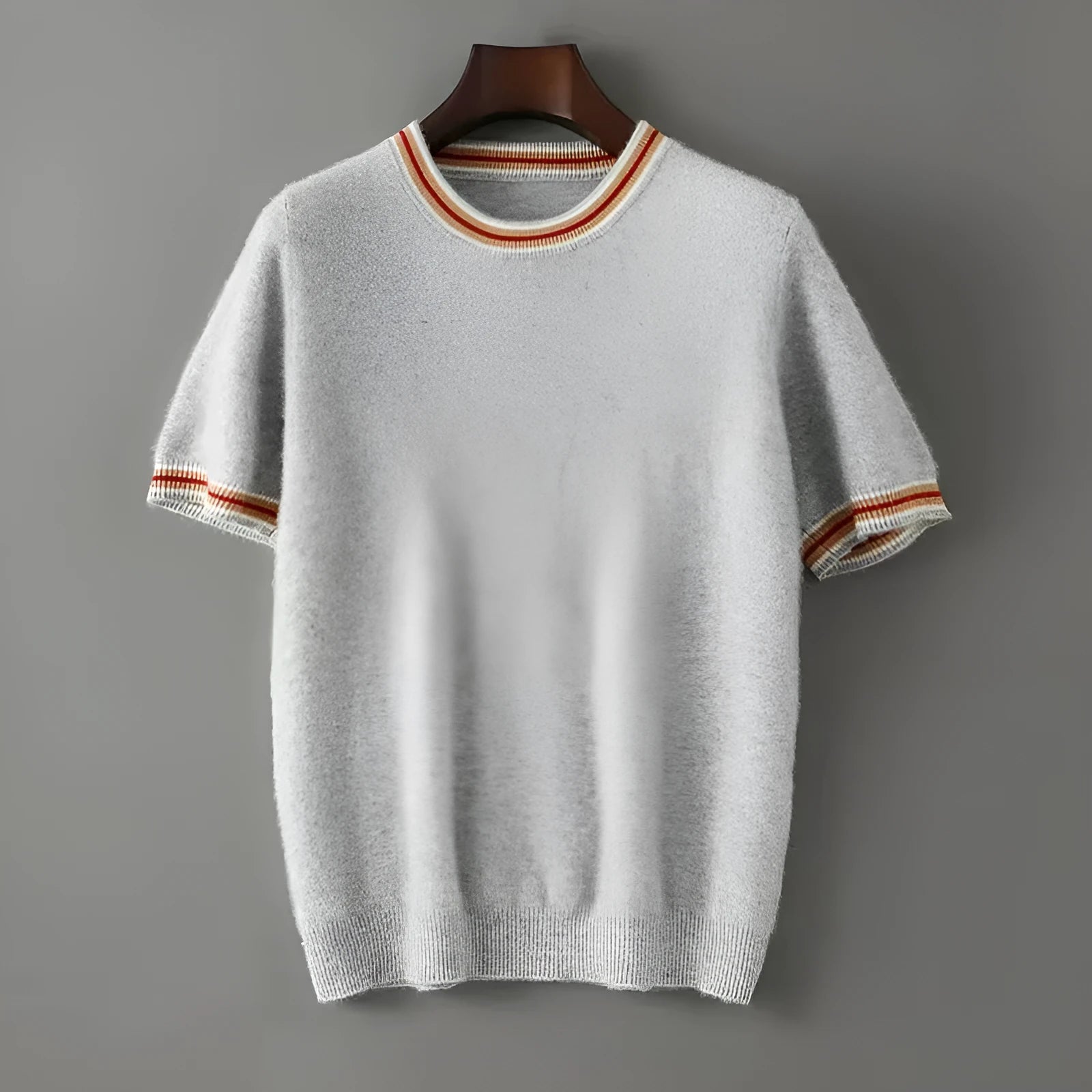 Men's round neck short sleeve pure wool pullover sweater in grey, shown on a model.