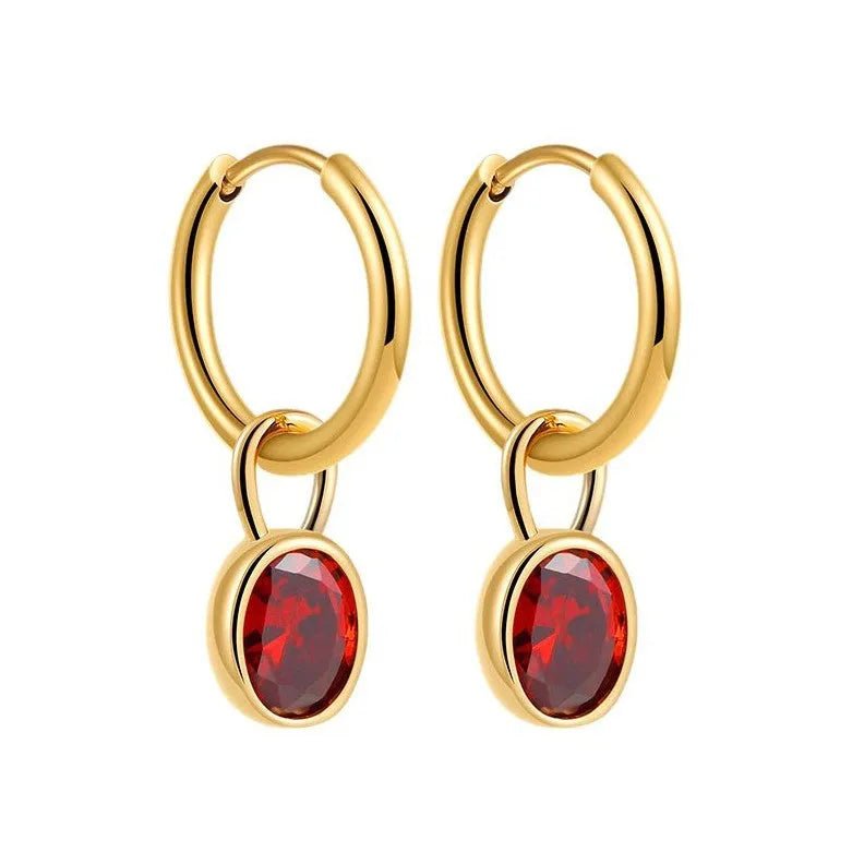 Close-up of a women's retro-style oval zircon earring in copper, showing elliptical stone setting and textured metal finish.