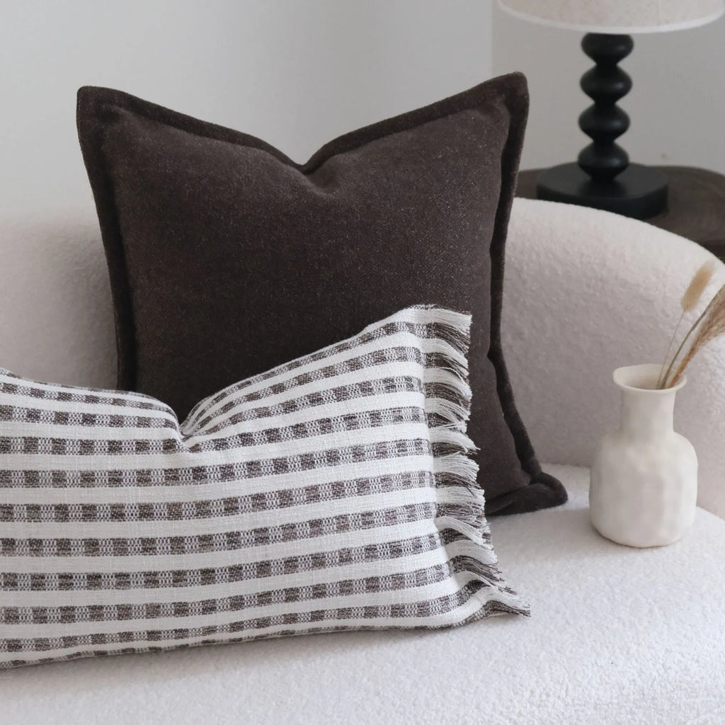 Coffee brown striped decorative cushion on a grey sofa, showing lumbar and square size options.