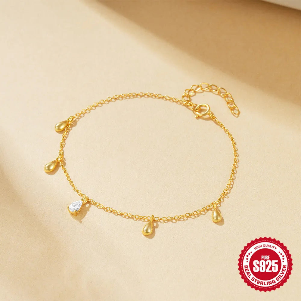 Sterling silver bracelet with gold-colour water drop diamond pendant geometric design