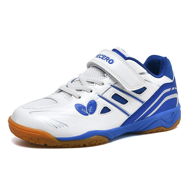 Lightweight white and blue badminton shoes with ribbed sole on an indoor court.
