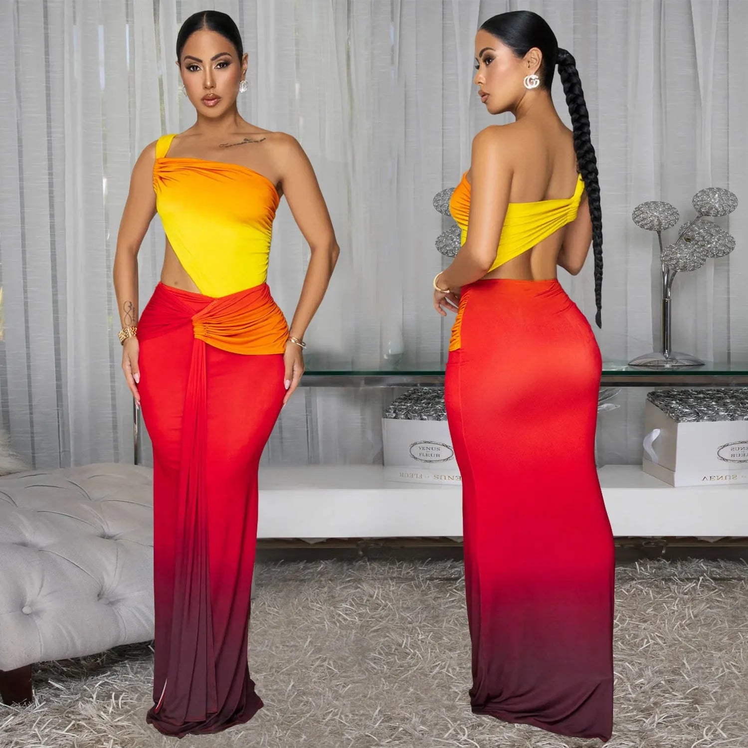 Long brown, green, and red gradient colour dress with a high waist, cross-shoulder neckline, and sleeveless design on a mannequin.