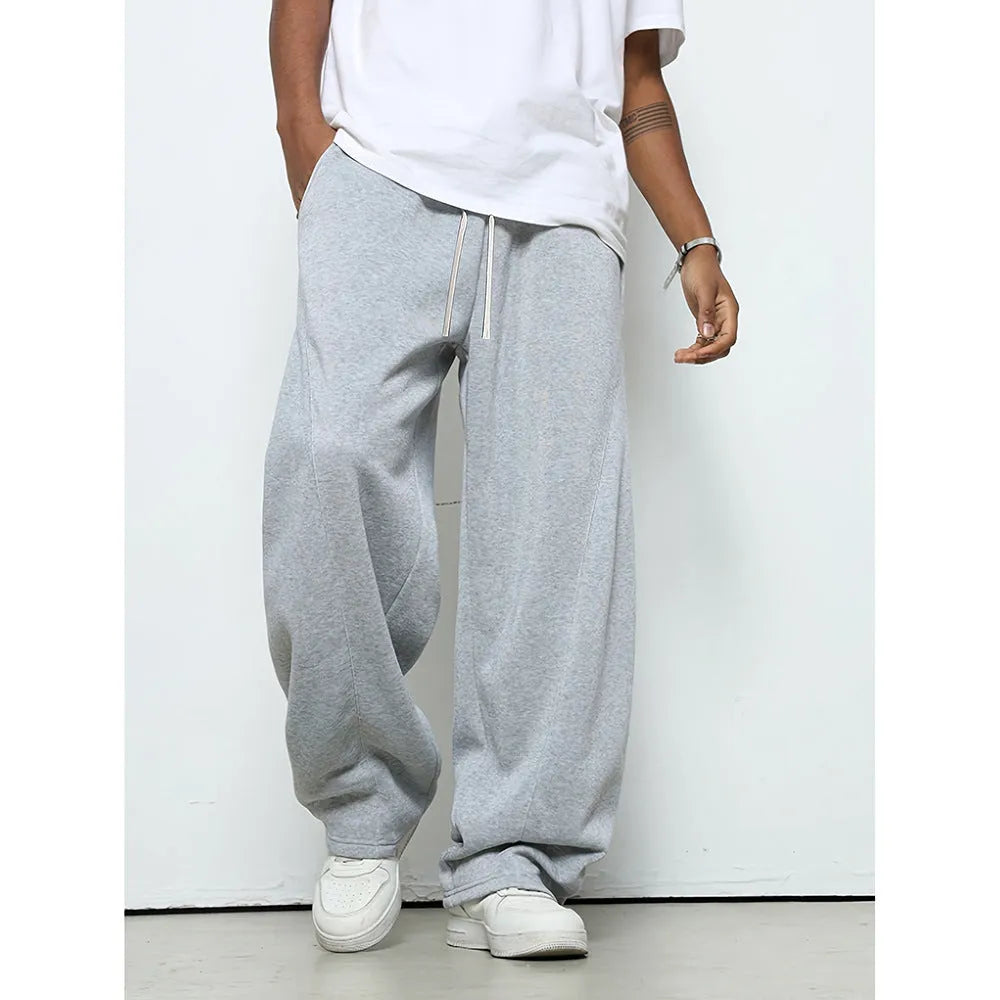 Men's straight-leg casual trousers in dark grey with a drawstring waistband.
