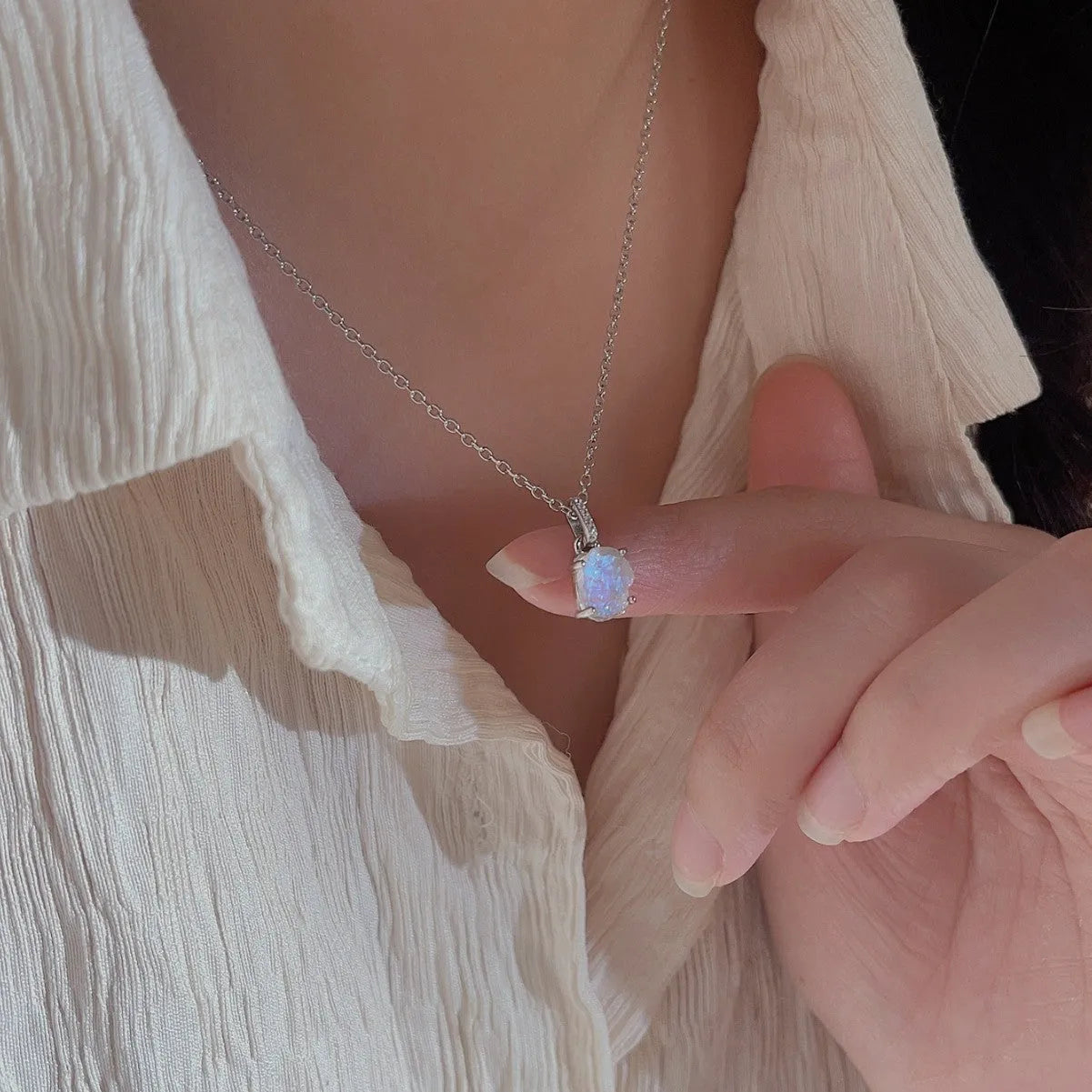 Geometric crystal moonstone pendant on sterling silver curb chain necklace