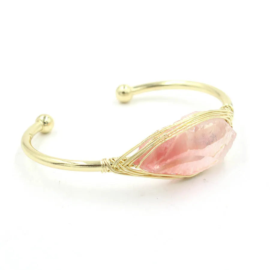 Natural raw gemstone bracelet with 8mm amorphous crystal beads on a white background.