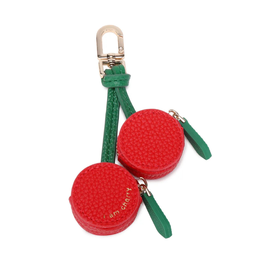 Small leather-look keychain coin purse in cherry red colour with a fresh fruit design.