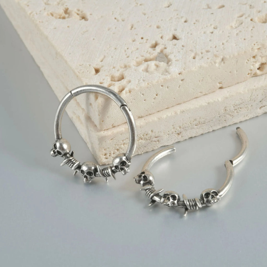 Copper ghost head punk earrings in ancient silver or gold finish with single or triple design