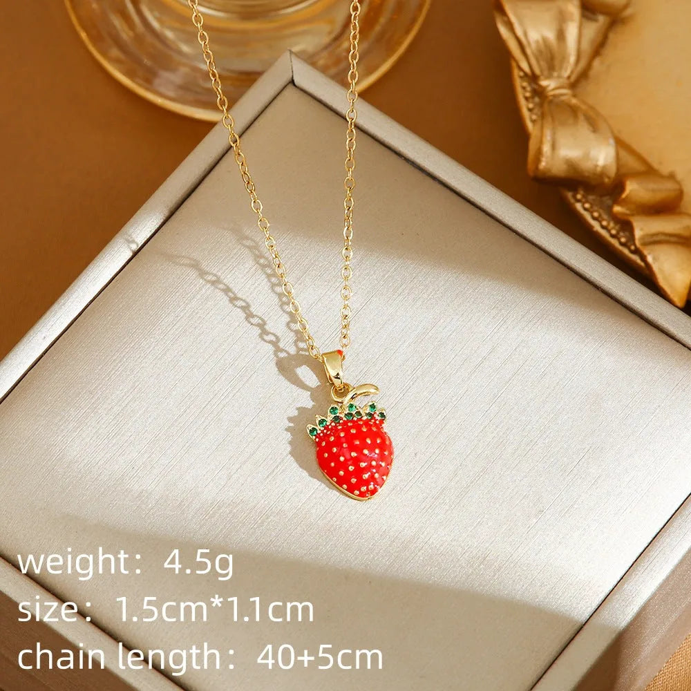 Red titanium steel necklace with a delicate alloy pendant shaped like cherries, strawberries, and peppers on an O-ring chain.