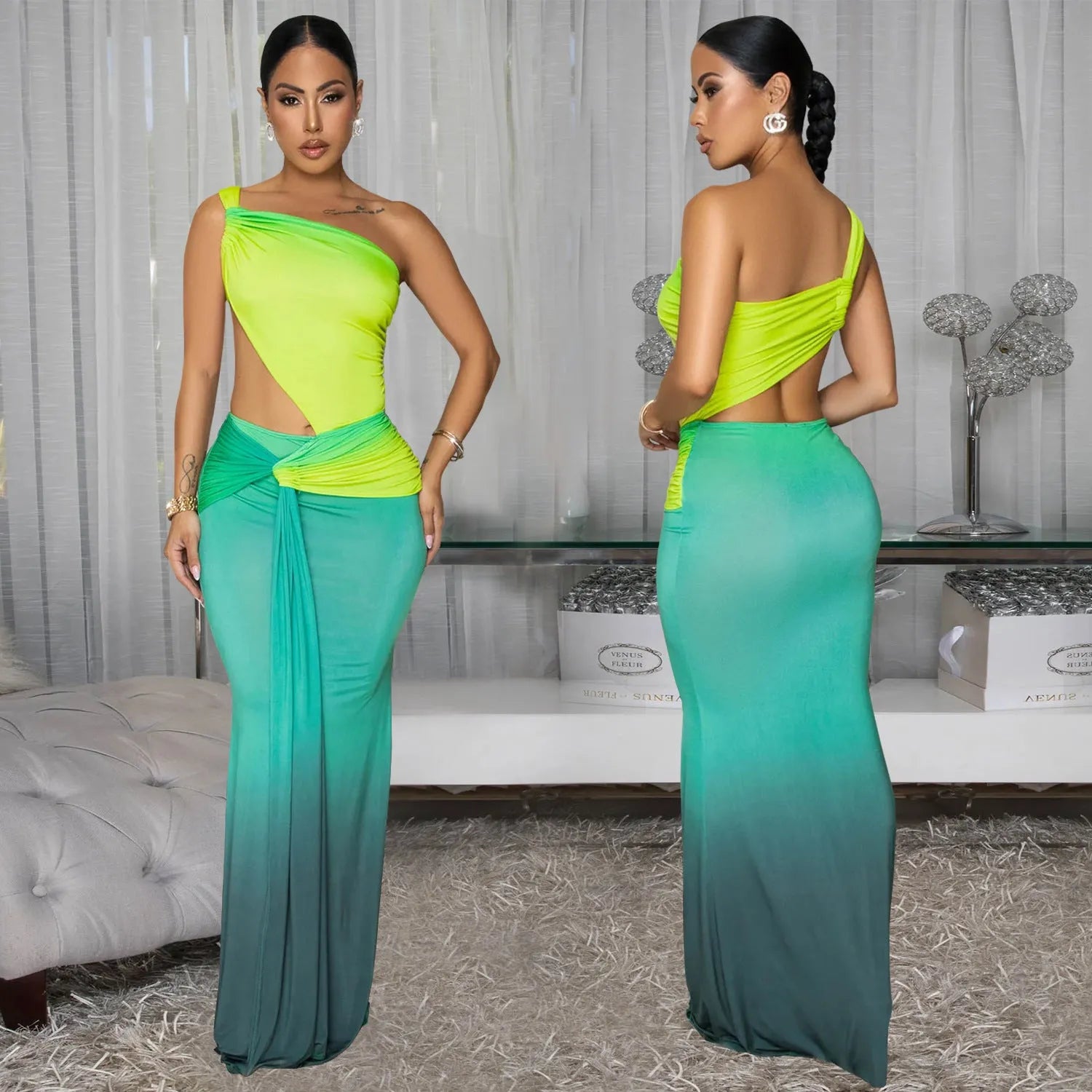 Long brown, green, and red gradient colour dress with a high waist, cross-shoulder neckline, and sleeveless design on a mannequin.