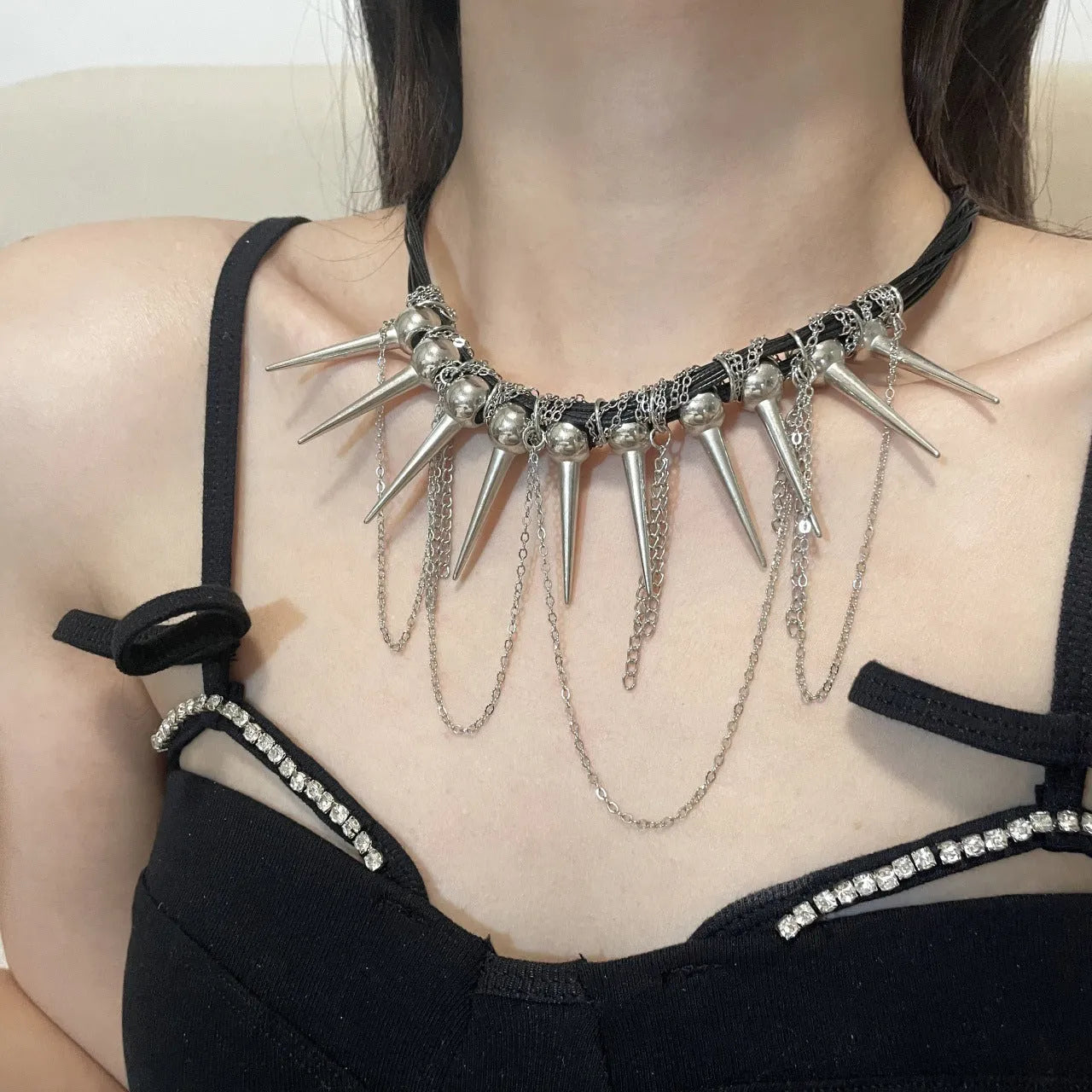 Leather necklace with winding tassel, round beads, and point rivet detailing for women