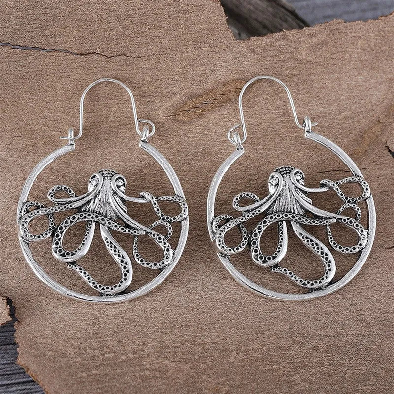 Vintage-style octopus earrings in antique silver with animal zodiac design