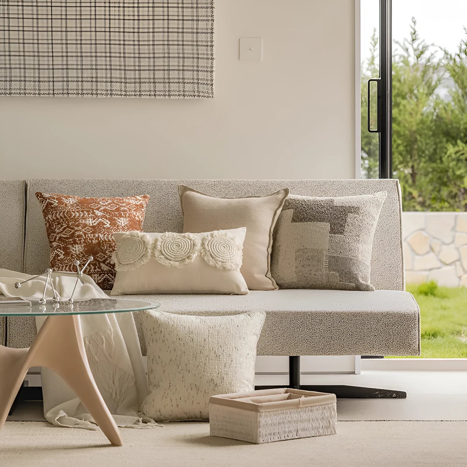 A square pp cotton pillow cushion with a solid red-brown abstract print cover on a sofa.