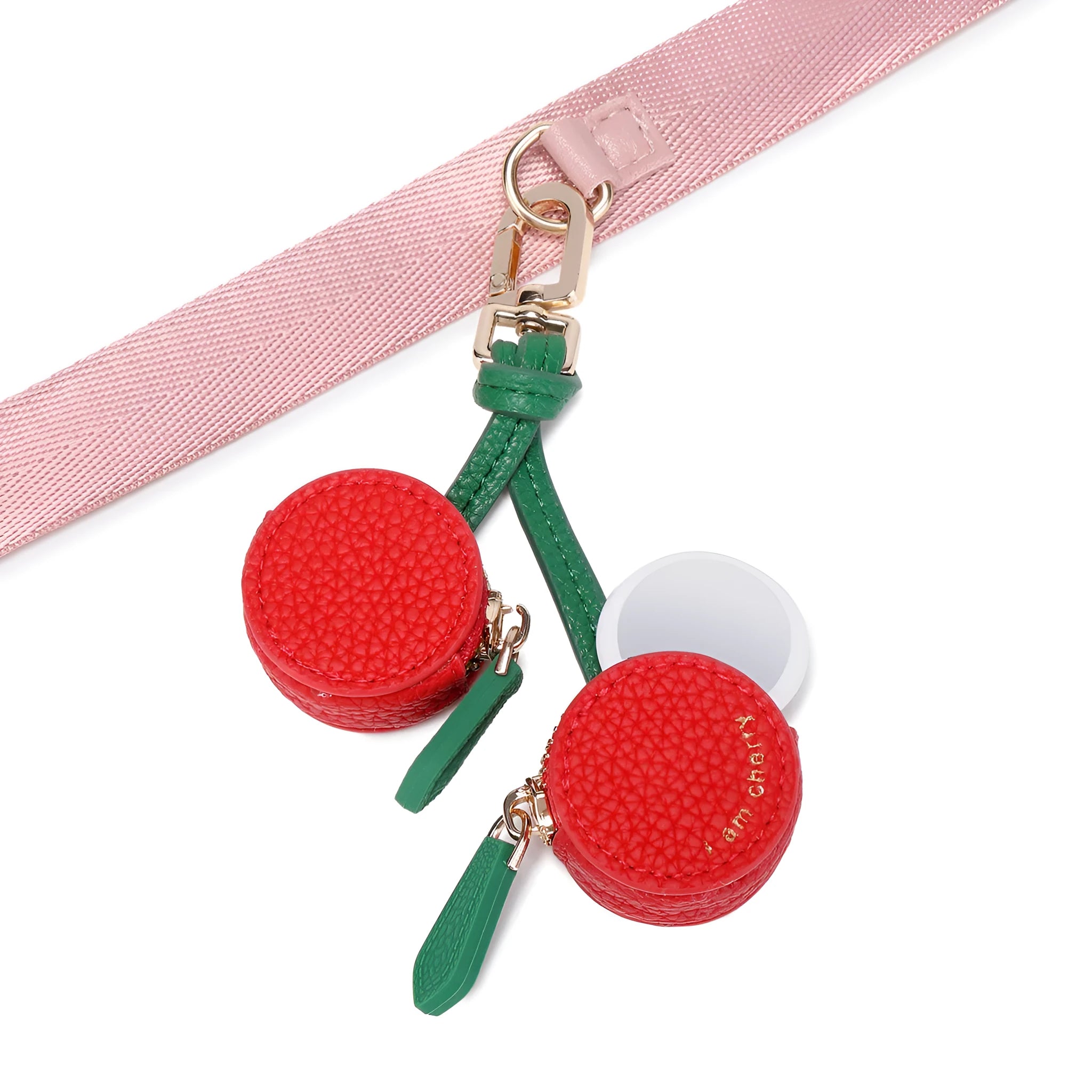 Small leather-look keychain coin purse in cherry red colour with a fresh fruit design.