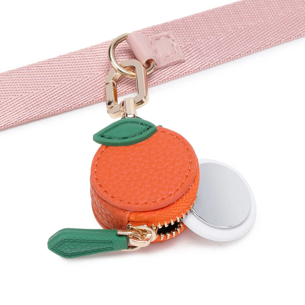Small leather-look keychain coin purse in cherry red colour with a fresh fruit design.